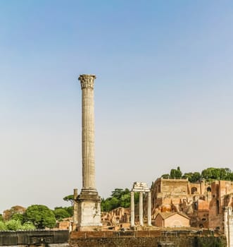 Ancient ruins in Roman Forum, Rome, Italy. Colonnade and historical monuments