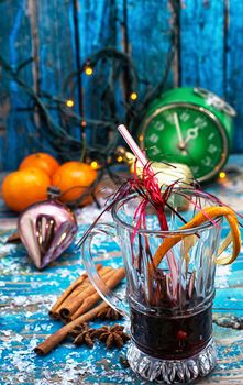 Christmas composition with mulled wine and tangerines