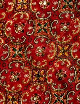 Red sari fabric closeup detail