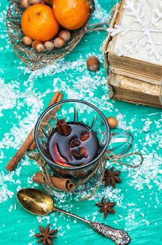 Christmas composition with mulled wine and tangerines