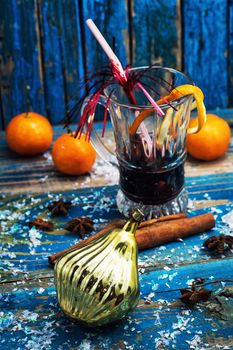 Christmas composition with mulled wine and tangerines