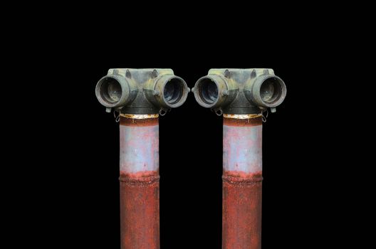 Two red fire hydrant on black background