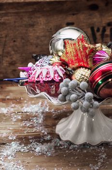 retro composition with old-fashioned toys on the Christmas tree