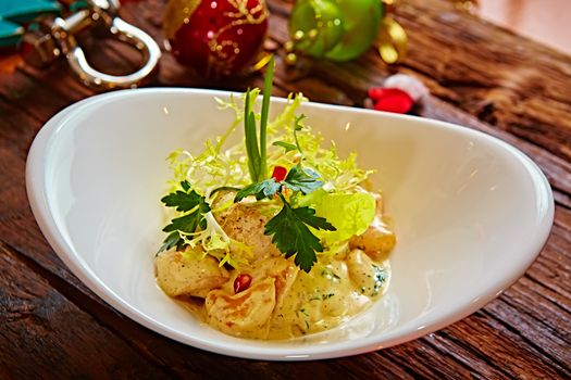 The griled chicken breasts in pesto souse
