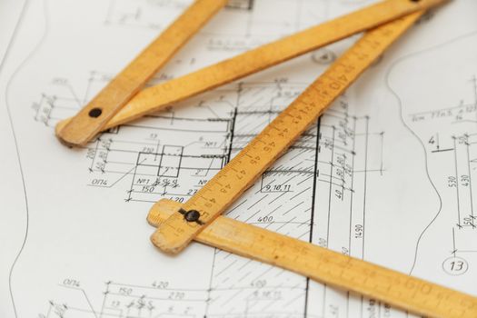 folding ruler on engineer drawing designs