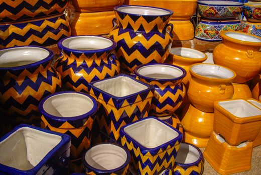 Colorful Mexican pots in outdoor market