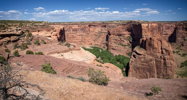 ancient native American trails and dwellings can all be found in Canyon de Chelly National Monument in Arizona.