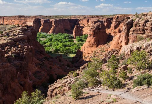 ancient native American trails and dwellings can all be found in Canyon de Chelly National Monument in Arizona.