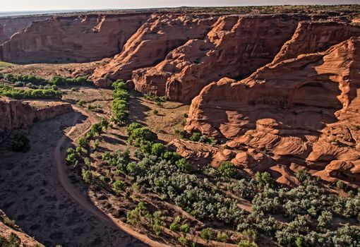 ancient native American trails and dwellings can all be found in Canyon de Chelly National Monument in Arizona.