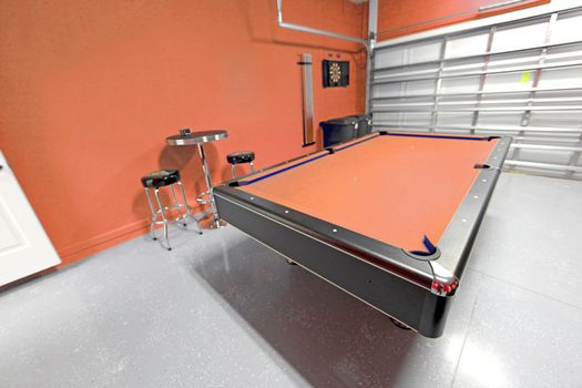 A Games Room with Pool Table in a Garage