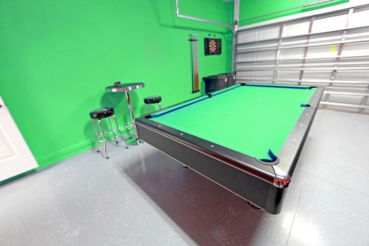 A Games Room with Pool Table in a Garage