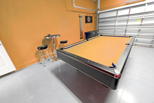 A Games Room with Pool Table in a Garage