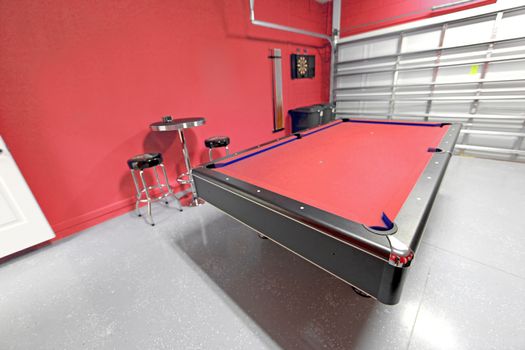 A Games Room with Pool Table in a Garage