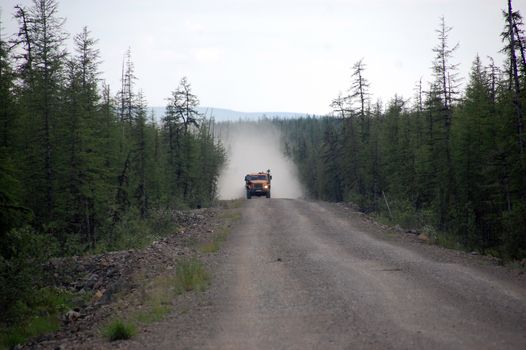 Truck at Chukotka gravel road taiga area, Russia