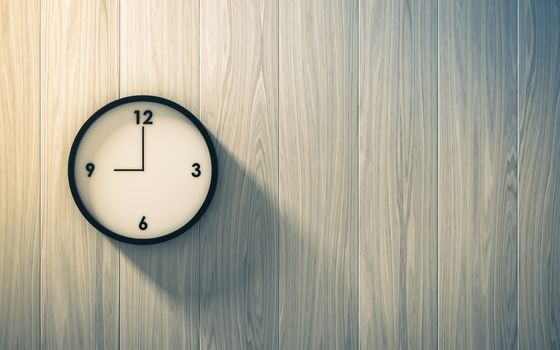 Black clock hanging on the wood wall , abstract background