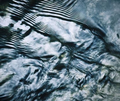 Abstract background dark line on the water level of the river