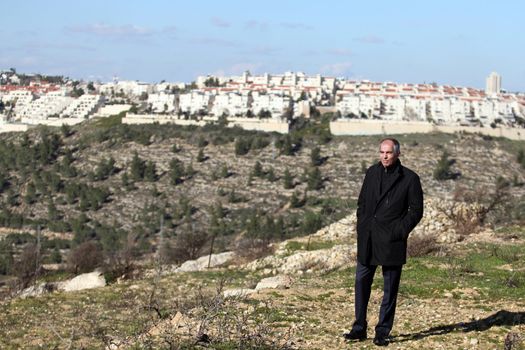 WEST BANK, Beit Jala:  French consul of Jerusalem Hervé Magro stands the Cremisan valley near Beit Jala, between West Bank and Israeli territory, on February 9, 2016 as Israel is about to make its largest land seizure in the West Bank since August 2014. He and a group of ambassadors and consuls from foreign countries attend a visit organized by Palestine liberation organization (PLO). Senior member of the central committee of Fatah, formerly named the Palestinian National Liberation Movement, Nabil Ali Muhammad Shaath and Palestinian Minister of Tourism, Rula Maayah also attend the visit.    	