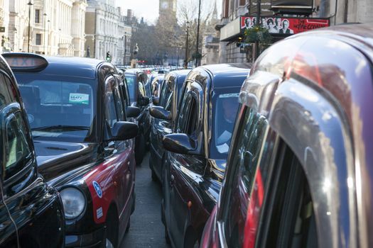 UNITED-KINGDOM, London: Dozens of black cab drivers stage a protest in central London, causing gridlock to Whitehall and Trafalgar Square as taxi drivers hold another protest under the hashtag #Blackcabprotest against competition from app-based taxi services, and especially US company Uber, on February 10, 2016. Since its introduction in Britain, drivers of the city's famous black cabs have argued Uber bypasses local licensing and safety laws and amounts to unfair competition. They have staged a number of high-profile protests, including go-slow demonstrations that have brought traffic in the centre of London from Trafalgar Square to Victoria street.