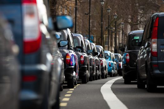 UNITED-KINGDOM, London: Dozens of black cab drivers stage a protest in central London, causing gridlock to Whitehall and Trafalgar Square as taxi drivers hold another protest under the hashtag #Blackcabprotest against competition from app-based taxi services, and especially US company Uber, on February 10, 2016. Since its introduction in Britain, drivers of the city's famous black cabs have argued Uber bypasses local licensing and safety laws and amounts to unfair competition. They have staged a number of high-profile protests, including go-slow demonstrations that have brought traffic in the centre of London from Trafalgar Square to Victoria street.