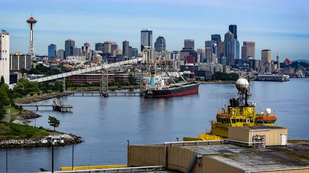 Seattle, Washington, USA- June 15, 2012: A view of Seattle's skyline and busy port on a summer day in the Pacific Northwest.