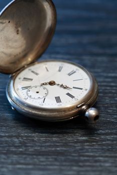 Hour workshop. Ancient inoperative silver pocket watch