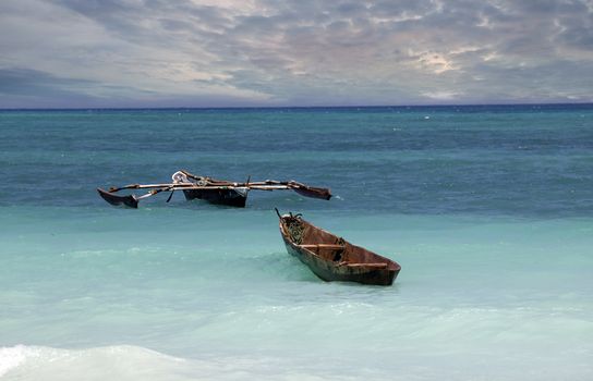 Traditional fishing boats in ocean. Zanzibar
