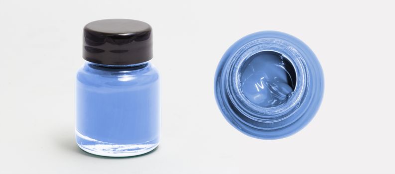 blue serenity acrylic color bottle side and top view white isolated with clipping path