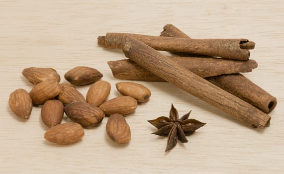 Random Spice on wood background almond cinnamon Star anise