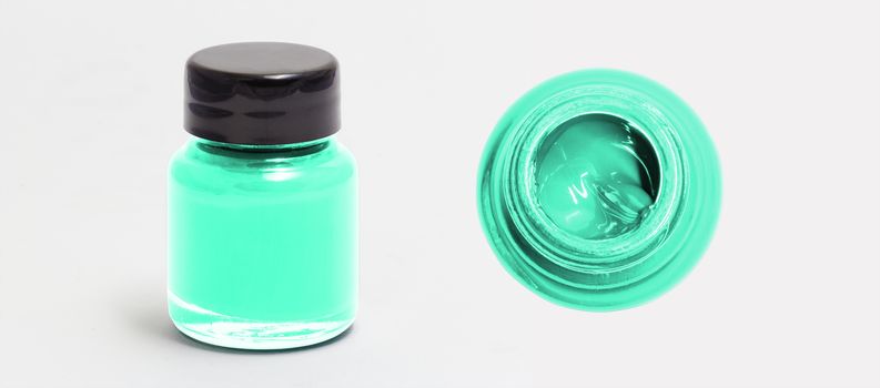 aquamarine acrylic color bottle side and top view white isolated with clipping path