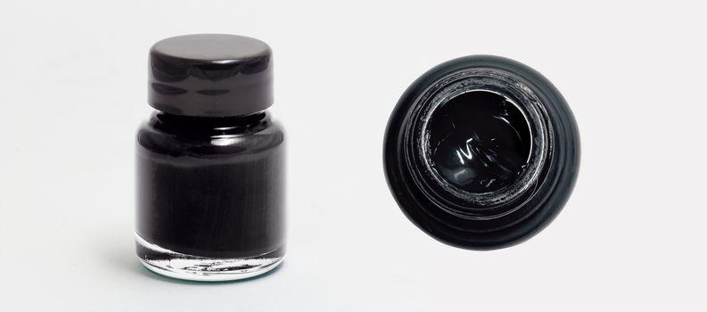 black acrylic color bottle side and top view white isolated with clipping path