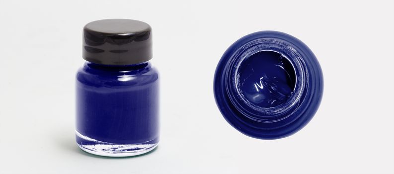 midnightblue acrylic color bottle side and top view white isolated with clipping path