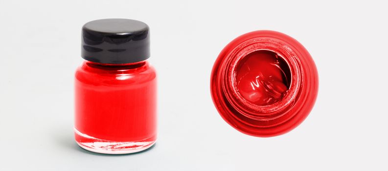 red acrylic color bottle side and top view white isolated with clipping path