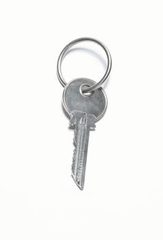 One silver key isolated on white background