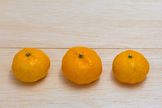 orange on wood background