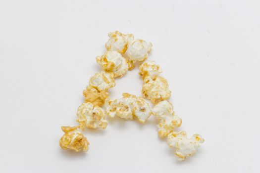 pop corn forming letter A isolated on white background