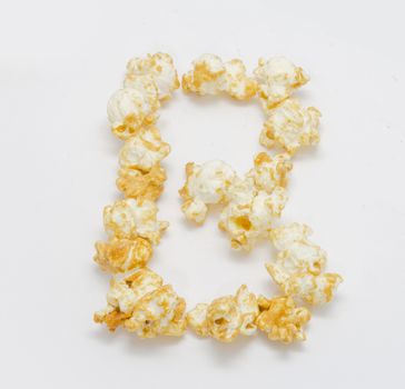 pop corn forming letter B isolated on white background