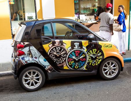 Small car with crazy clocks painted on the sides in Old San Juan, Puerto Rico.
Photo taken on: June 15th, 2013