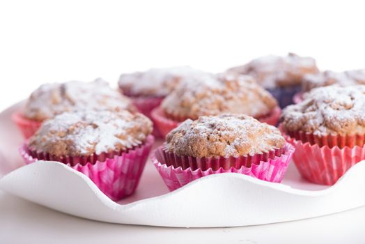 Coffee cocoa cinnamon cake Muffins powdered with sugar on white background