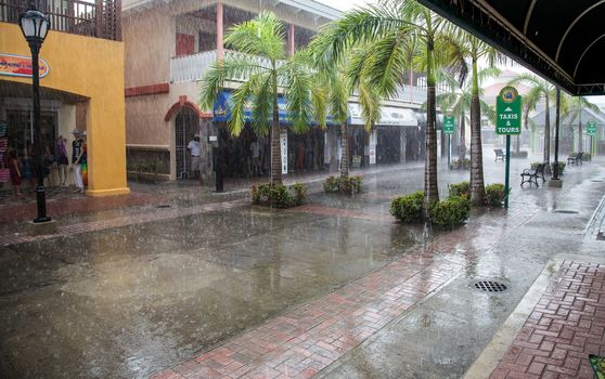 A large rainstorm his the island of St. Kitts in the Caribbean and puts a hault to the shopping for a few moments.
Photo taken on: June 21st, 2013