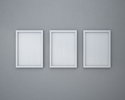 3 Blank frame on  gray wall.