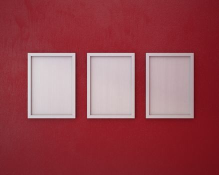 3 Blank frame on  red wall.