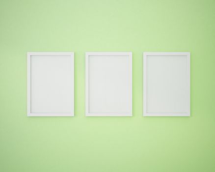 3 Blank frame on  lime green wall.