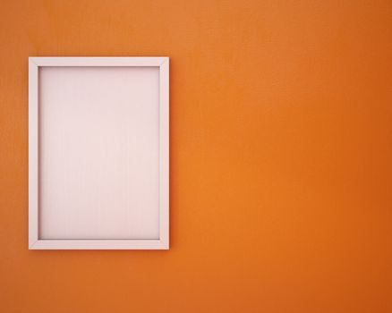 Blank frame on orange wall.