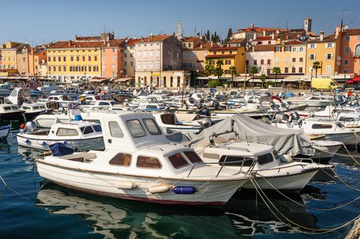 Boats in marina of Rovinj, Istria, Croatia. Typical mediterranean seaside town.