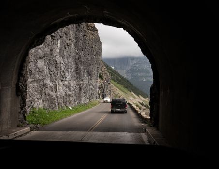 A view of the steep cliffs through a tunnel along the Going to the Sun Road in Glacier National Park in Wyoming.
Photo taken on: July 11th, 2015