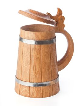 Isolated wooden beer mug with cap on the white