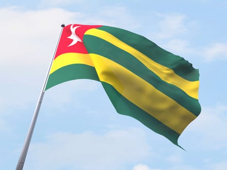 Togo flag flying on clear sky.