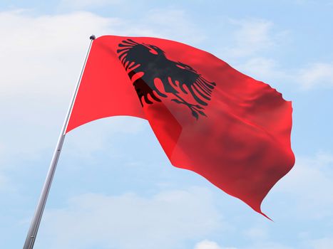 Albania flag flying on clear sky.