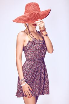 Hippie boho woman in hat. Beauty young playful positive blonde, pigtails, ethnic accessories relax, having fun. Floral sundress, romantic style. Attractive loving girl. Unusual creative,people