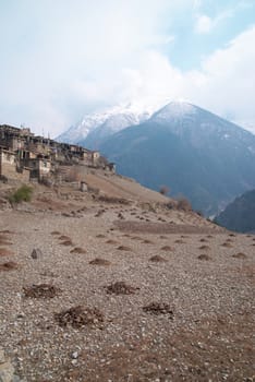 Tibetan mountain's landscape with sky, field and valley